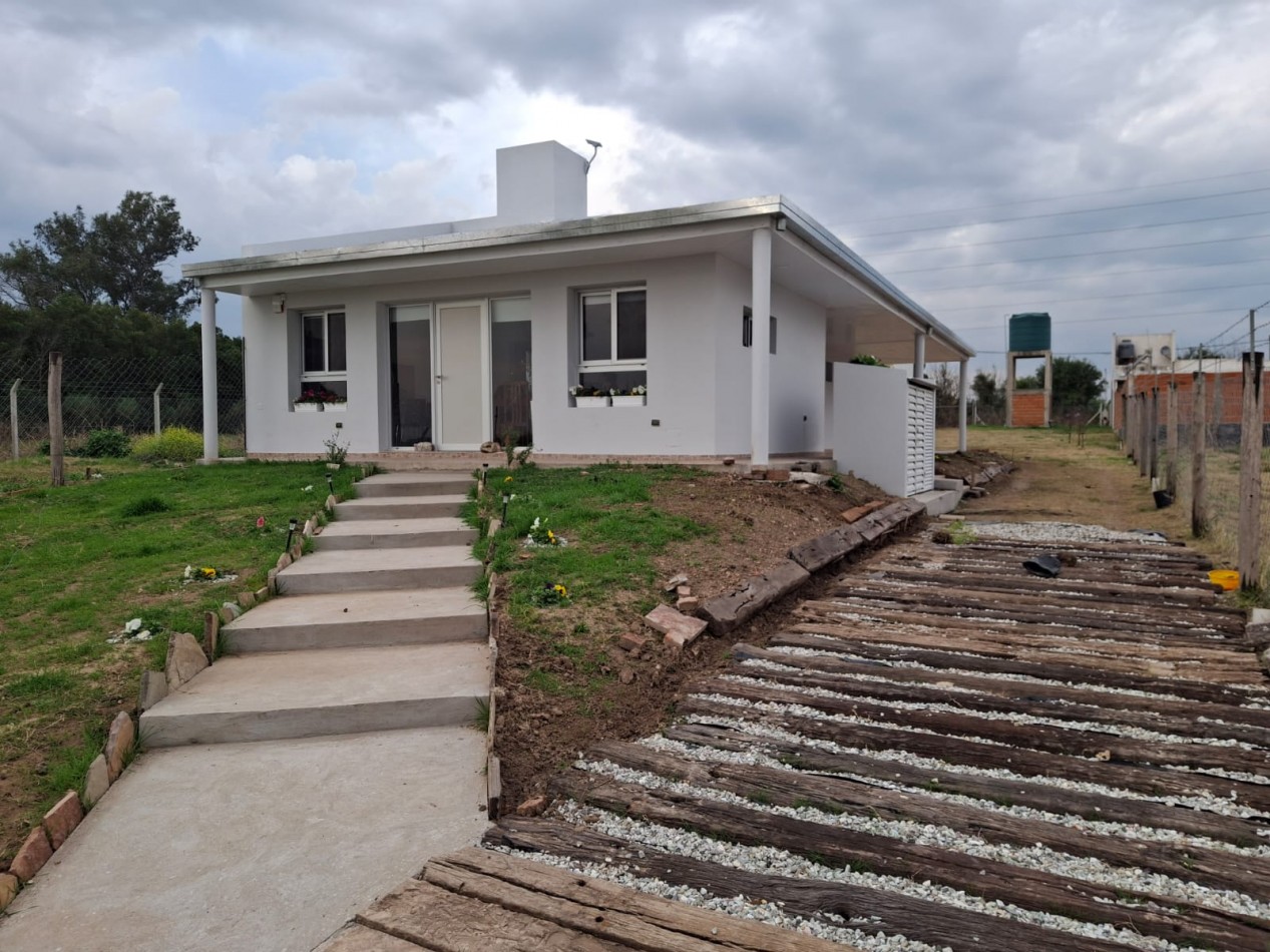 Brisas del Acceso Norte casa c/lote 800 m2